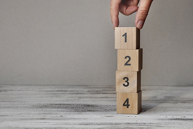 Stack of blocks that read 1-4